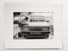 Man Washing Vauxhall Astra Mk1