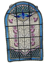 Machine embroidered peacock