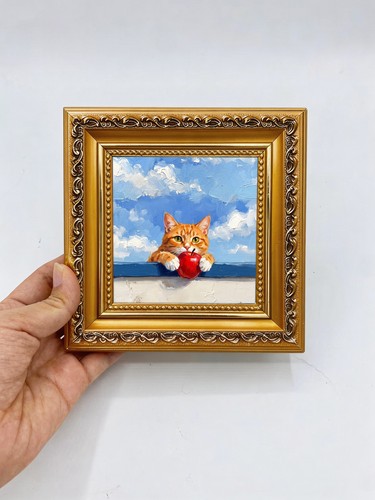 Orange cat holding - holding, heart