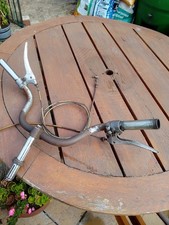 Handlebar and control(brake)levers from a mobylette av42s .Will re chrome