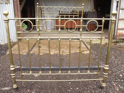 Victorian brass bed with iron