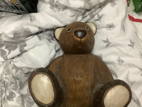 Carved wooden teddy bear