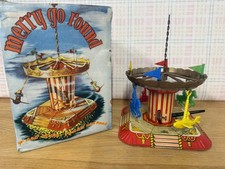 Vintage Windup Rotating Merry