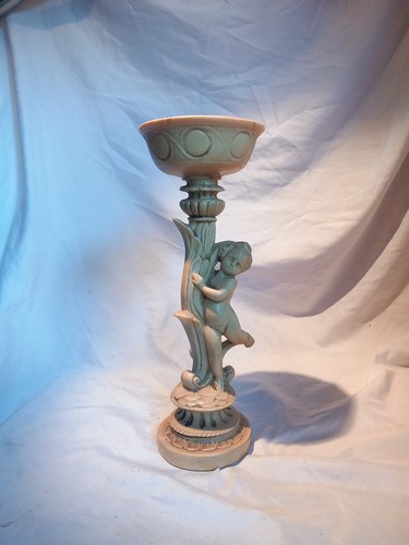 Resin cherub and - and,