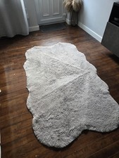 Large grey faux fur rug