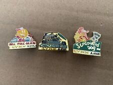 Lynx Atari 3xBadges Ms. Pac-Man/Checkered Flag/Scrapyard Dog