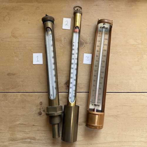 Two brass one copper cased - brass,