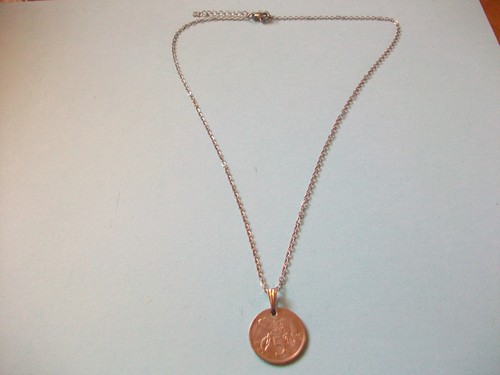 Five cent coin - five,