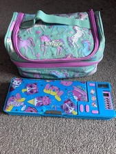 Smiggle unicorn lunch bag and LoL pop out pencil case
