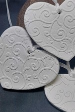 3 HANDMADE WHITE CLAY SWIRLY