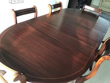 Regency style reproduction extendable wooden table, 6 dining chairs & protector