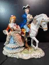 Vintage Porcelain Figurine of a rich young man on a horse & a lady with a fan