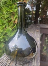 Offering a dark green/olive onion bottle 