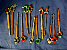Thirteen wooden midlands style lace bobbins with spangles