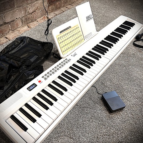 White key electric piano - white,