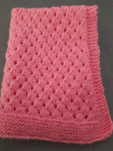 Hand knitted dolls - hand, pram/cot