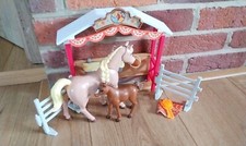 Horse and foal play set.Exellent condition. Stable. Hay and water bucket.Gift