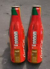 Pair Of Vintage Coca Cola London Olympics 2012 Aluminium Empty Cola Bottles.
