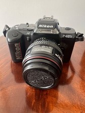 Nikon Camera 35mm F401S SLR with a 28-70mm & a 70-210mm Tokina AF Autofocus Lens