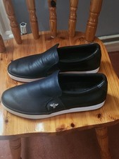 Pair of black leather white