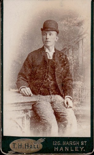 Young man hat studio hall - man,