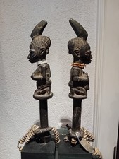 pair of yoruba shango ibeji figures staff