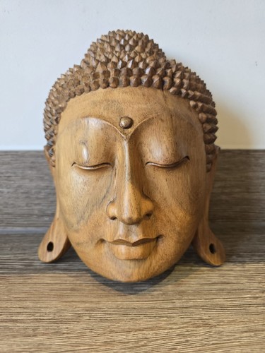 Hand carved wood buddha head - hand,