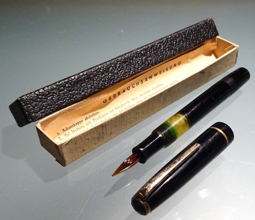 Ancient piston fountain pen - piston,