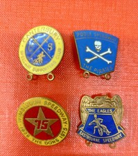 Vintage enamel badges