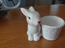 pre loved from tiger white bunny joined too an egg cup unused just in a cupboard