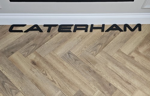 Caterham font style - font,