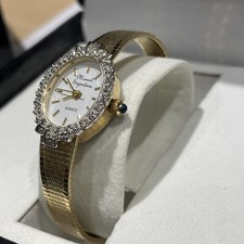 Marcel Drucker Gold Tone