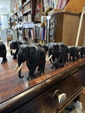 Set Of  4 Black Wooden Hand Carved Elephants