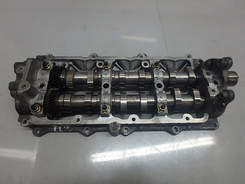 Valve cover with camshafts