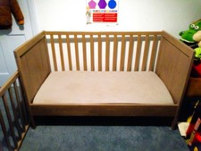 IKEA Sundvik Baby Cot + Mattress & protector cover, + top sheet. Grey-Brown Used