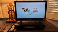 Bundle of Sony Bravia KDL-22EX320 22" HDMI LCD TV & Harmon Kardon DVD 25 