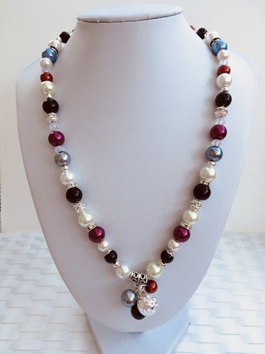 Multicoloured glass pearl - glass,