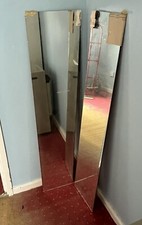 Two large pieces of unframed mirror glass aprox 46 x 11 inches Good Quality