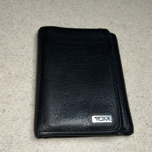Tumi black tri fold leather - tumi,