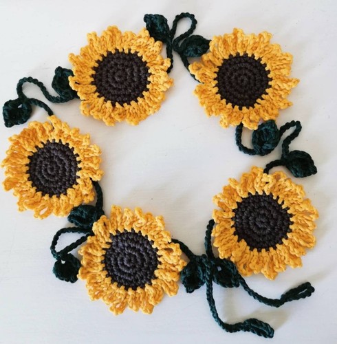 Hand crochet sunflower - hand,