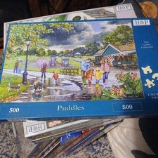 HOUSE OF PUZZLES/ HOP UNUSUAL PIECES 500 PIECE JIGSAW - PUDDLES