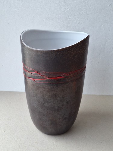 Large red and black glass - and, vase