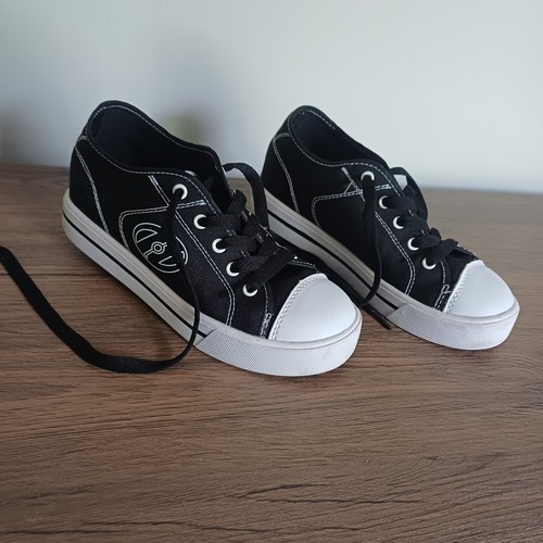 Black and white heelys - and,