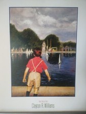 BOY AT BOAT POND IN PARIS C