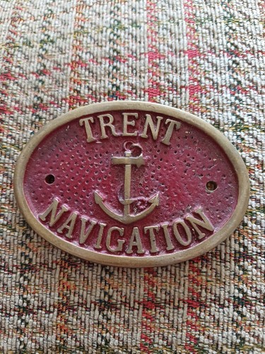 Cast iron brass plaque of - iron,