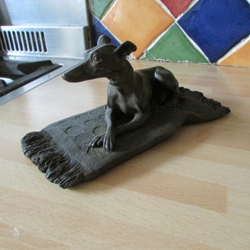 Bronze greyhound dog