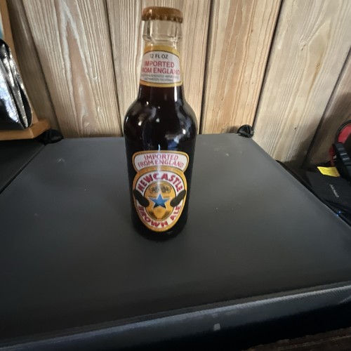 Newcastle glass beer bottle - beer,