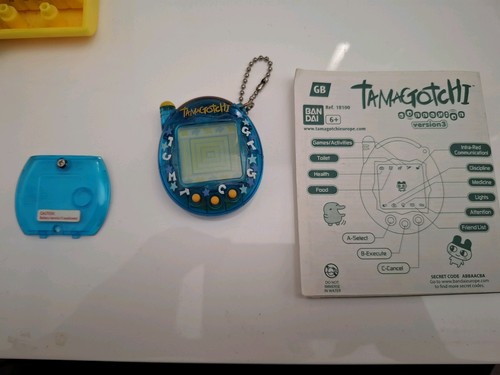 Tamagotchi translucent blue - ,