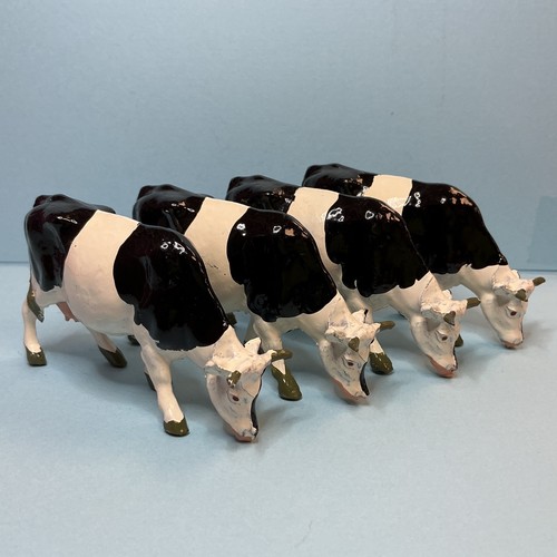 Britains etc cows feeding - cows,