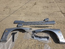 Genuine R33 GTR Front Wings Sideskirts Fender Risers and Grill